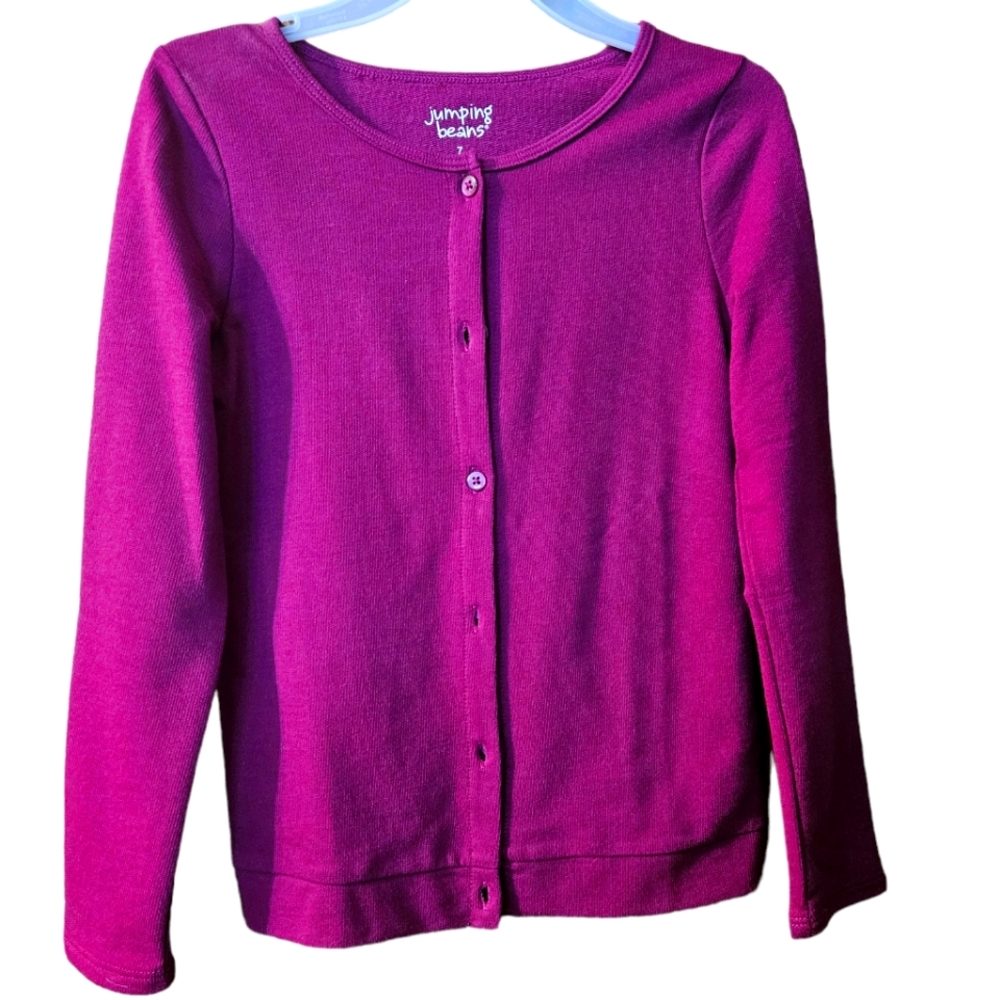 Girls size 7 Jumping Beans Cardigan. It is more of a Maroon color.